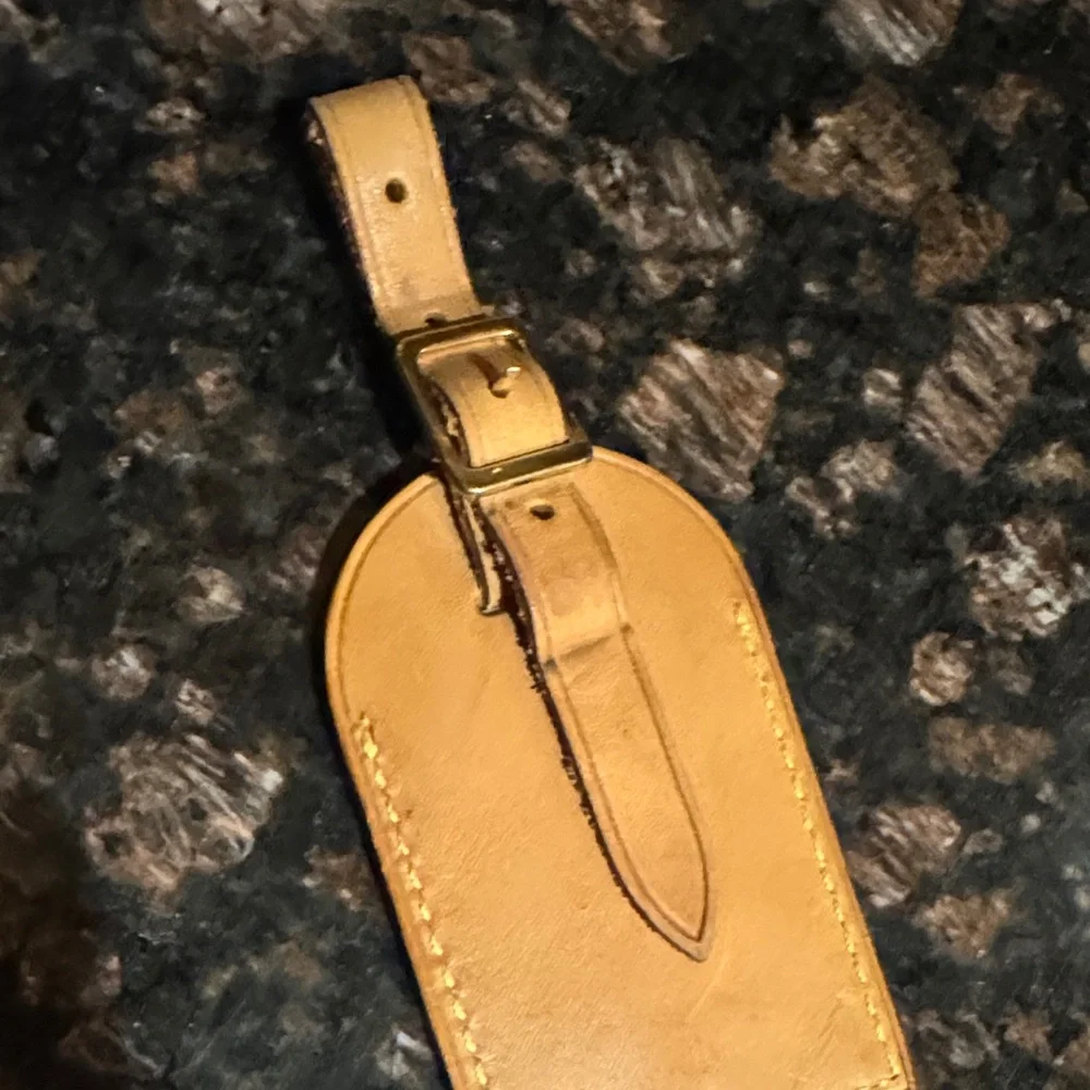 Louis Vuitton Beige Leather Tag